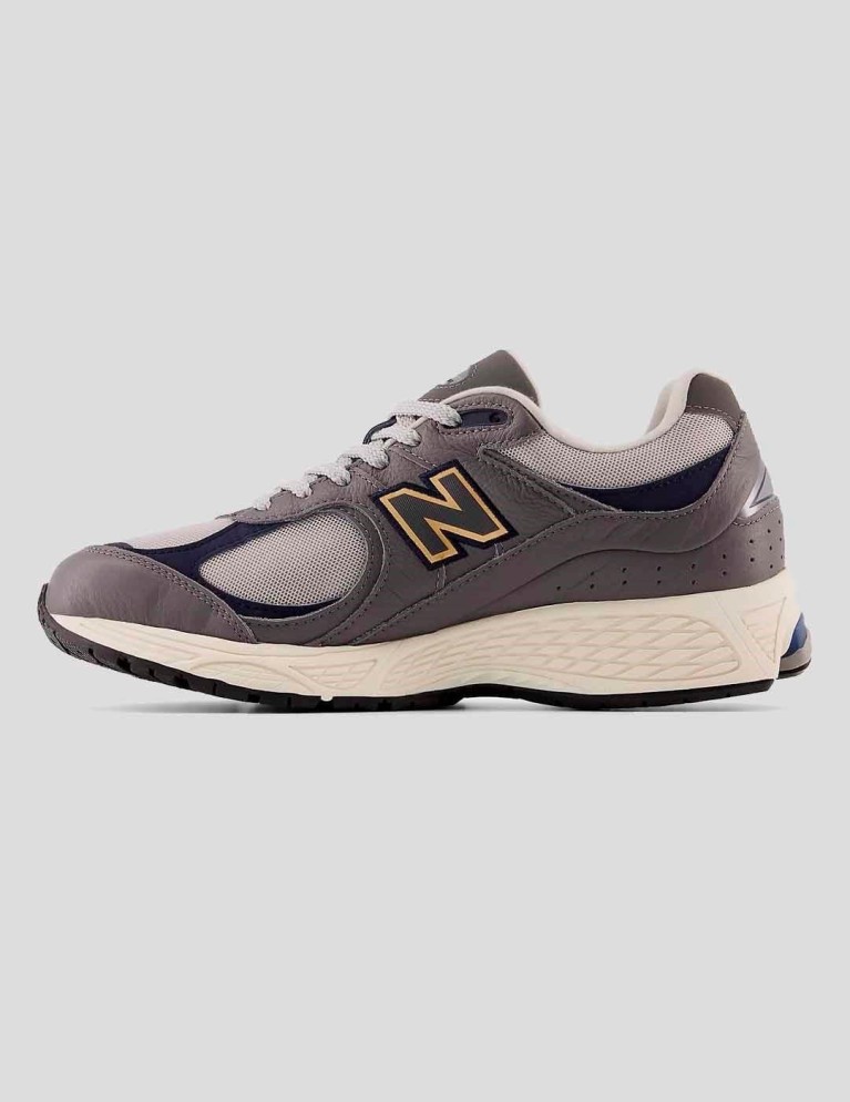 Zapatillas NEW BALANCE 2002r castlerock eclipse gold metallic